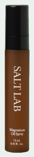 Brown bottle of Salt Lab Magnesium Oil Spray with black cap on a white background
